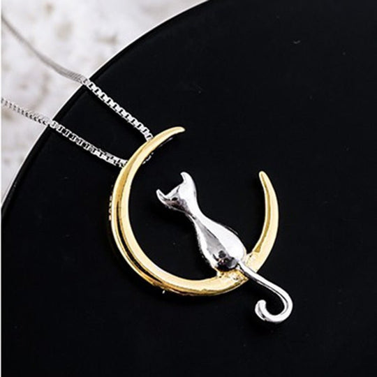 Elegant halsband med katt och halvmåne