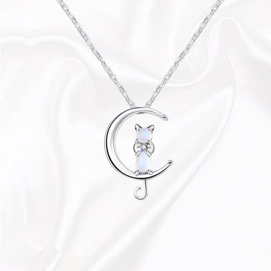 Halsband med liten katt och månsten