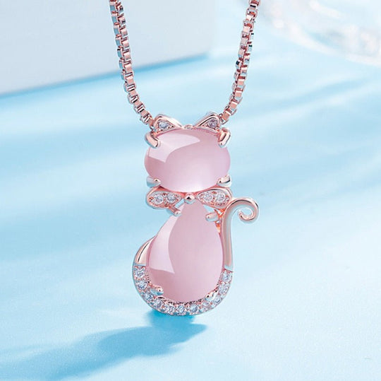Rosa katthängsmycke med zirkon